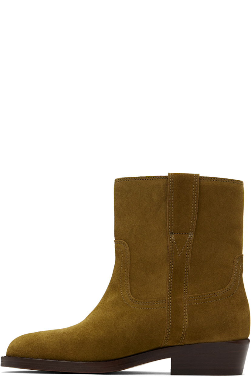 Ankle-high suede calfskin boots in brown.

· Logo-engraved hardware at outer side
· Topstitching at welt
· Nubuck calfskin lining
· Stacked leather heel with rubber injection
· Leather sole
· Heel: H1.25"

Supplier color: Sepia