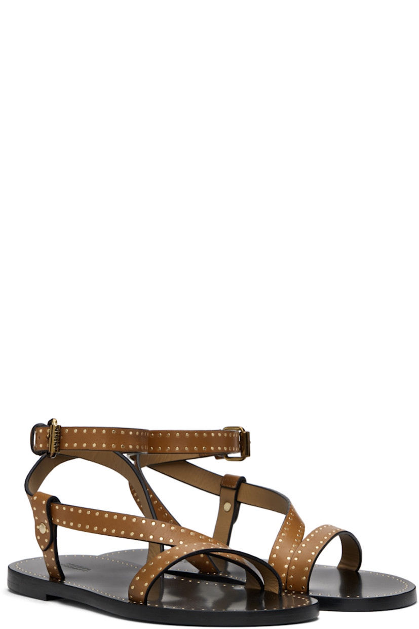 Buffed leather flat sandals in brown.

· Studded detailing throughout
· Open toe
· Strap at vamp
· Wraparound pin-buckle ankle strap
· Logo embossed at footbed
· Polished leather sole with rubber injection
· Logo-engraved antiqued brass-tone hardware

Supplier color: Havana