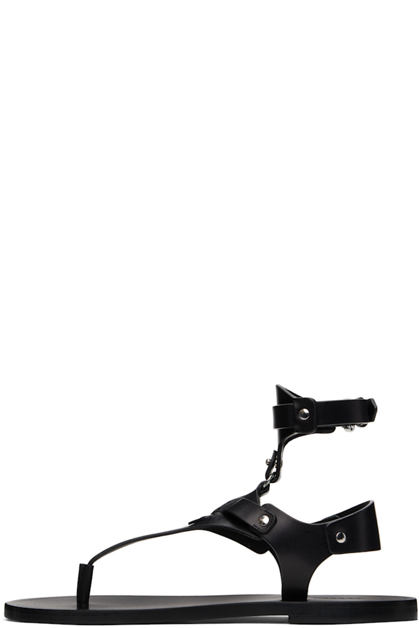 Buffed leather flat sandals in black.

· Rivets throughout
· Thong-style strap at open toe
· Pin-buckle vamp and ankle strap
· Logo embossed at footbed
· Polished leather sole with rubber injection
· Silver-tone hardware

Supplier color: Black