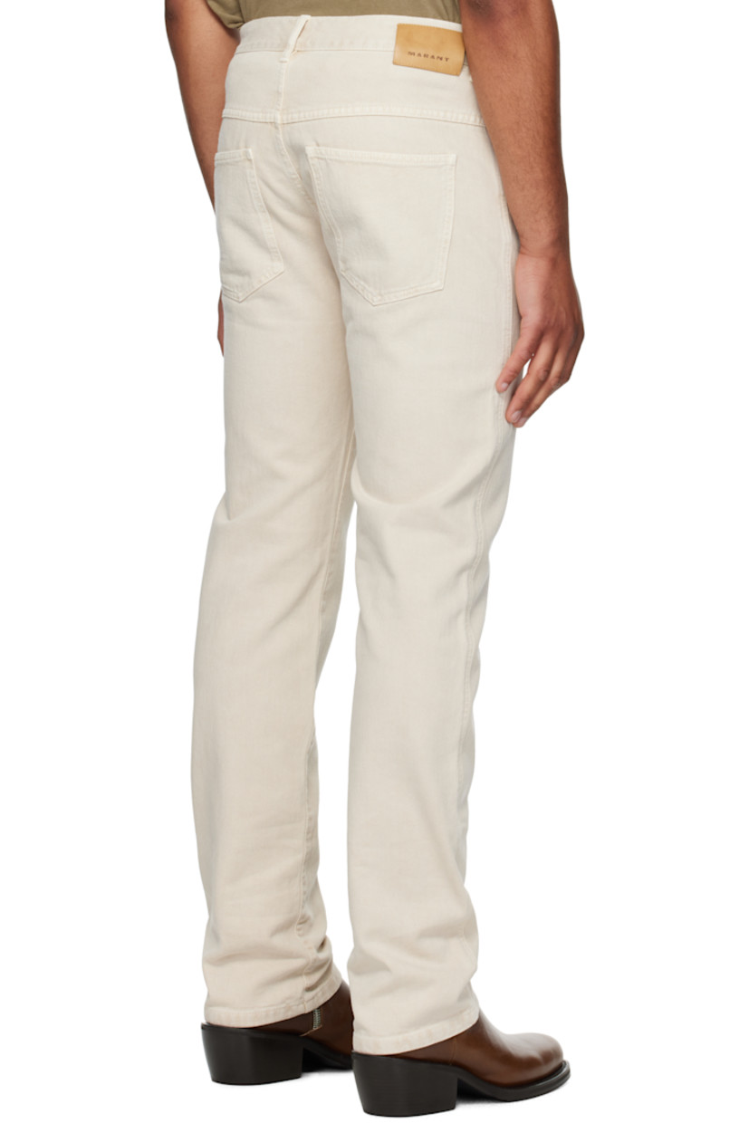 Non-stretch denim jeans.

· Belt loops
· Five-pocket styling
· Zip-fly
· Leather logo patch at back
· Logo-engraved silver-tone hardware
· Contrast stitching in tan

Supplier color: Off-white