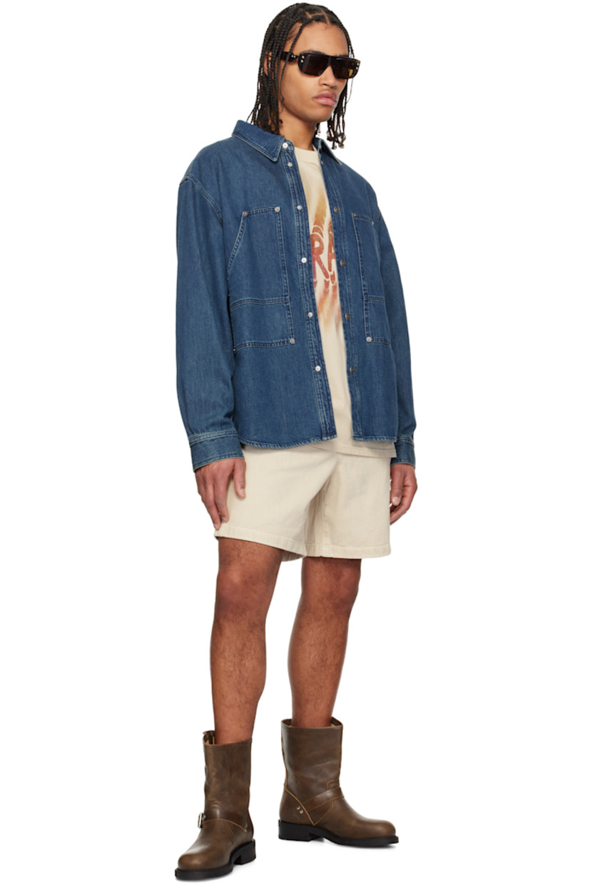 Non-stretch denim shirt. Fading throughout. 

· Paneled construction
· Spread collar
· Press-stud closure
· Patch pockets with rivets
· Shirttail hem
· Buttoned barrel cuffs
· Silver-tone logo-engraved hardware

Supplier color: Blue