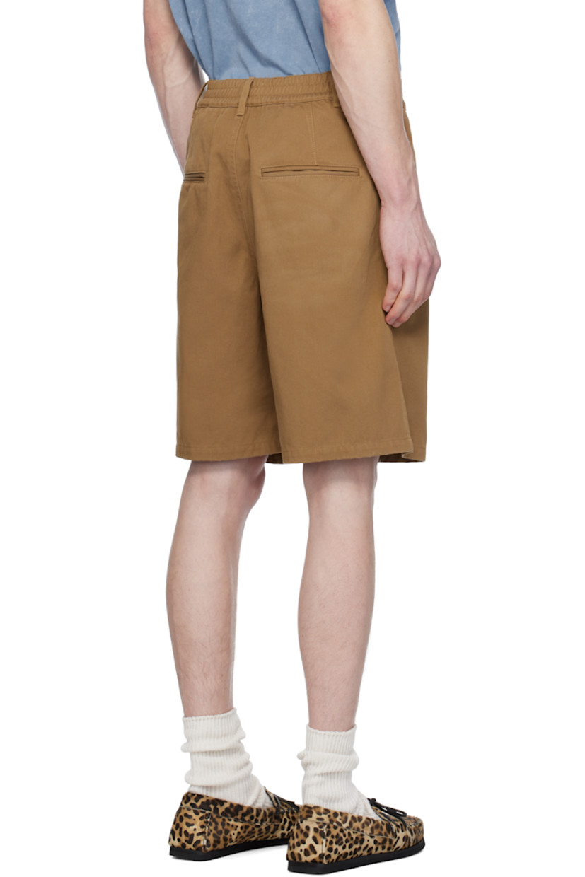 Cotton twill shorts. 

· Mid-rise
· Belt loops at partially elasticized waistband 
· Four-pocket styling 
· Zip fly 
· Pleats at front 
· Darts at back waistband 
· Logo-engraved antiqued gold-tone hardware 

Supplier color: Toffee