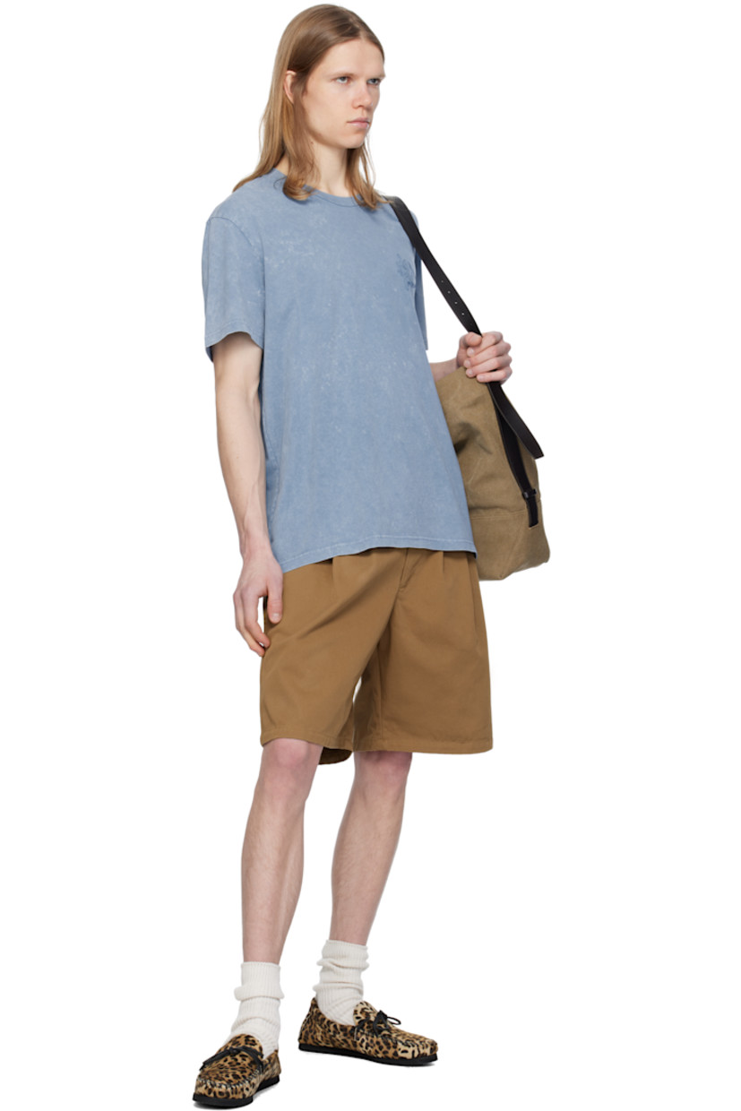 Cotton twill shorts. 

· Mid-rise
· Belt loops at partially elasticized waistband 
· Four-pocket styling 
· Zip fly 
· Pleats at front 
· Darts at back waistband 
· Logo-engraved antiqued gold-tone hardware 

Supplier color: Toffee