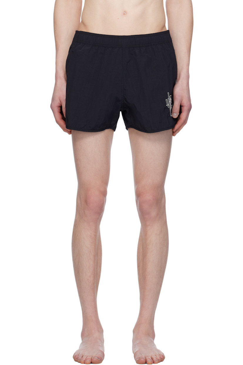 Polyester taffeta swim shorts. 

· Concealed drawstring at elasticized waistband
· Two-pocket styling
· Logo graphic embroidered at leg
· Vent at cuffs 
· Briefs-style mesh lining

Supplier color: Faded black