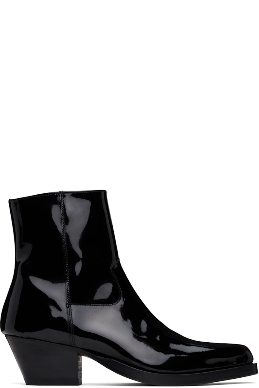 Ankle-high patent calfskin boots in black.

· Pointed toe
· Zip closure at inner side
· Buffed leather lining
· Stacked leather block heel with rubber injection
· Polished leather sole
· Heel: H2"

Supplier color: Black patent leather