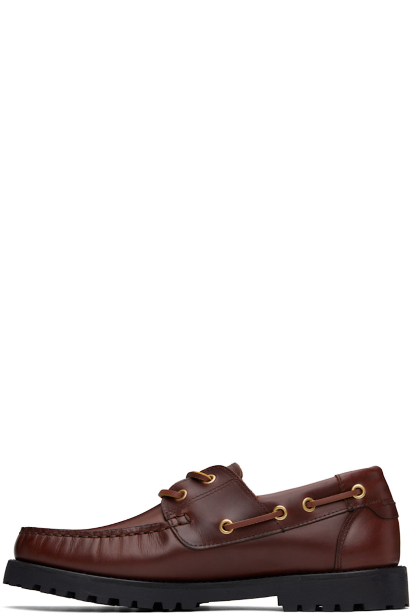 Buffed calfskin boat shoes in brown.

· Moc toe
· Lace-up closure
· Lace-up detailing at collar
· Buffed leather lining
· Foam rubber heel and midsole
· Treaded rubber sole

Supplier color: Brown leather