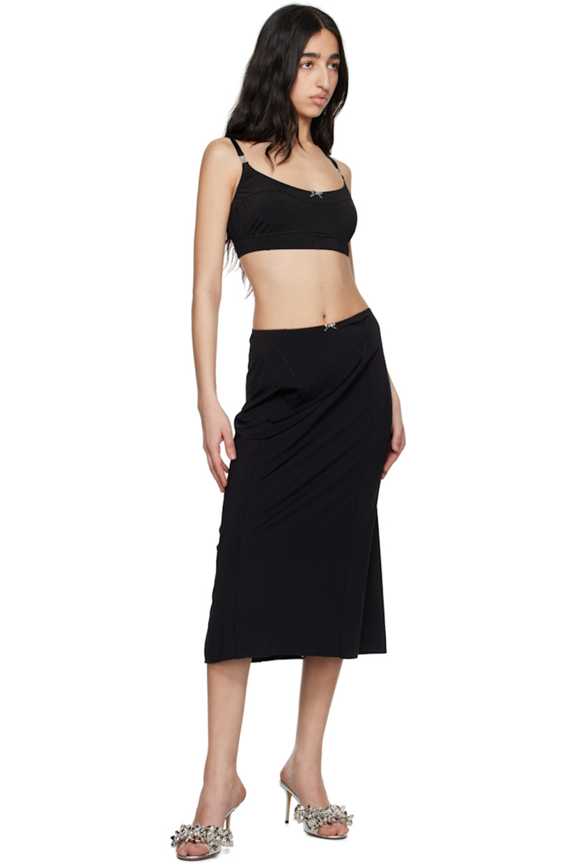Stretch viscose jersey midi skirt.

· Paneled construction
· Picot trim and bow at elasticized waistband
· Central vent at back hem
· Unlined

Supplier color: Black