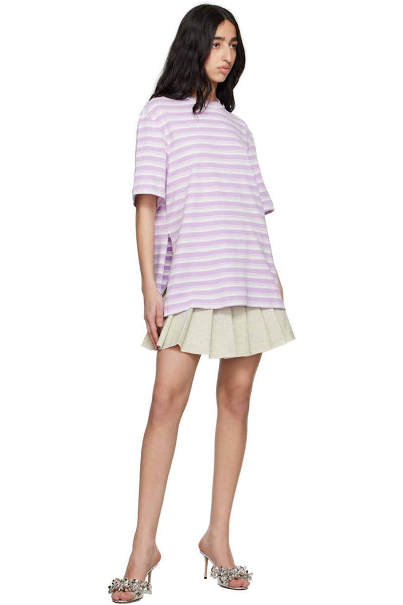 Cotton jersey T-shirt. Stripes throughout. 

· Rib-knit crewneck
· Logo hardware at front hem and back collar
· Vented side seams
· Dropped shoulders

Supplier color: White and lilac striped