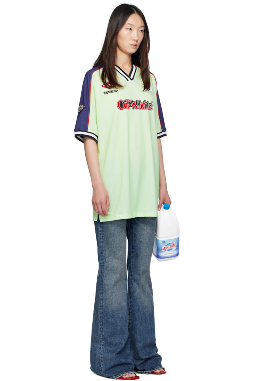 Polyester mesh minidress.

· Striped rib-knit V-neck and cuffs
· Graphic embroidered at chest
· Printed logo graphics and bonded logo at front
· Vented side seams
· Stripe appliqué and piping at sleeves
· Embroidered logo patch at sleeve
· Logo embroidered at back collar

Supplier color: Lime cream/Aurora