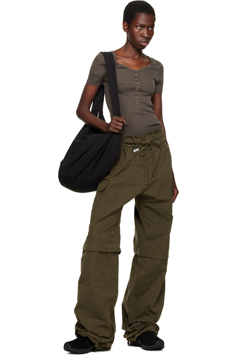 Low-top suede slip-on sneakers in black.

· Elasticized gusset at padded tongue
· Padded collar
· Logo embossed at outer side
· Pull-loop at heel tab
· Jersey lining
· Merrell M Select™ FIT.ECO molded footbed
· Merrell Air Cushion at heel midsole
· Treaded Kinetic Fit™ BASE rubber sole

Supplier color: Midnight