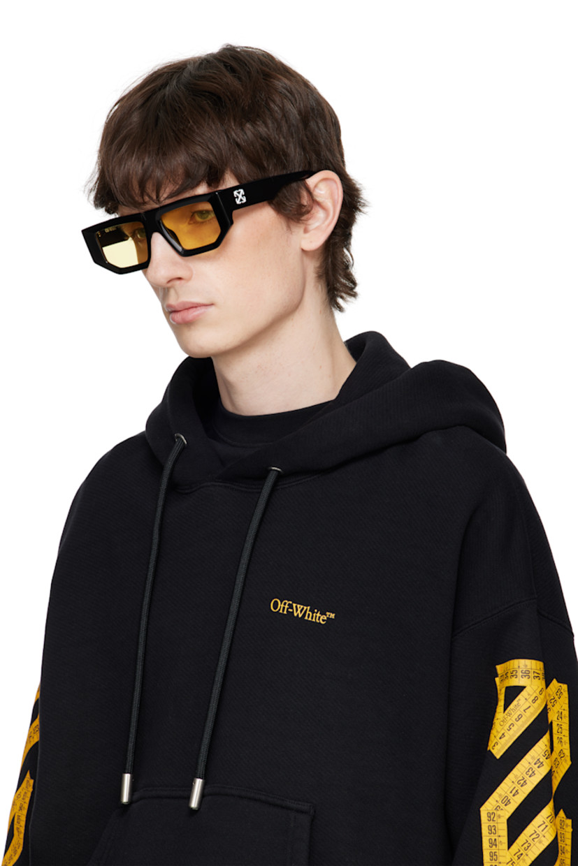 Rectangular acetate-frame sunglasses in black.

· Yellow lenses, category 1
· Integrated nose pads
· Logo hardware at temples
· Includes pouch
· Size: 53.17 145

Supplier color: Black/Yellow