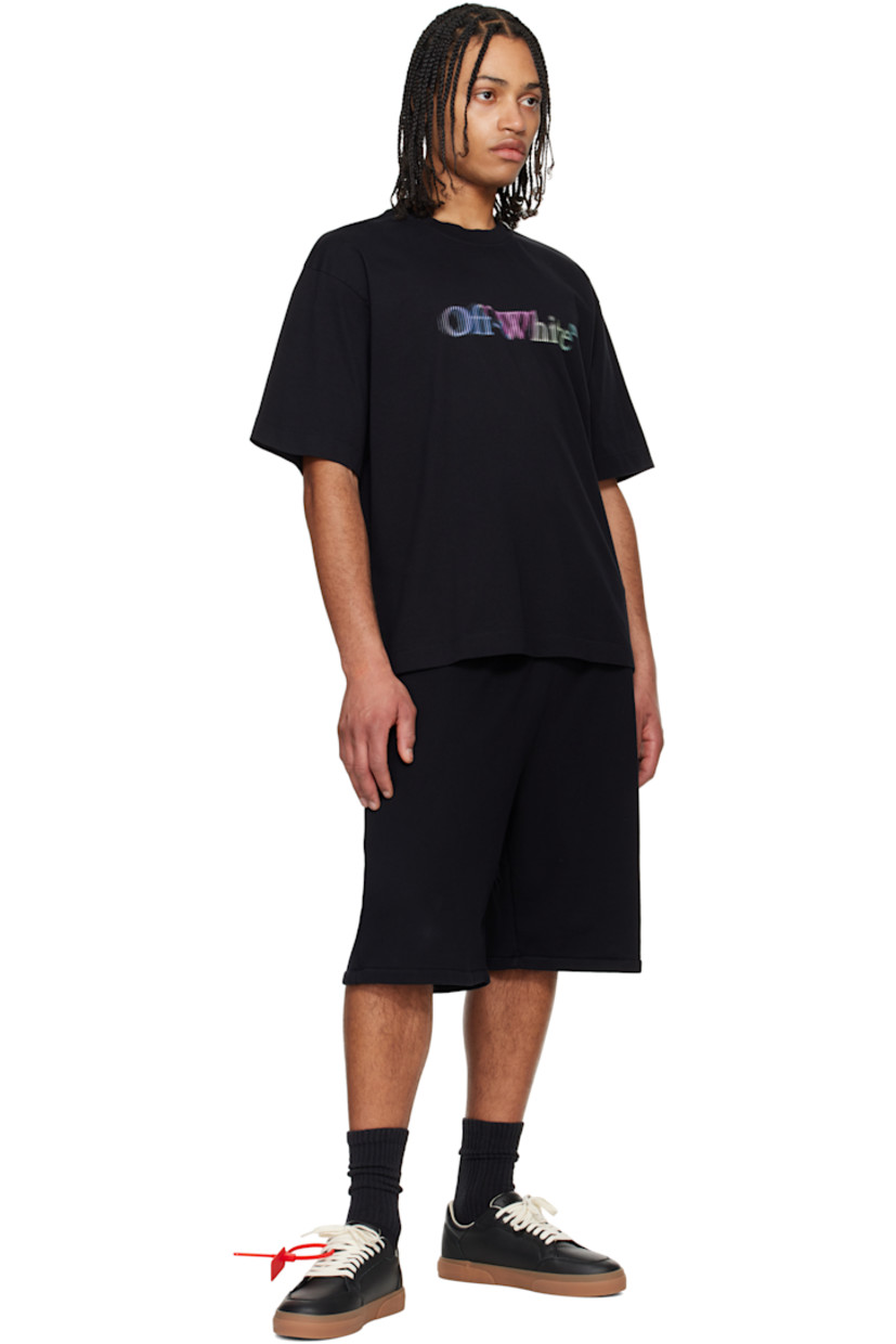 Cotton jersey T-shirt.

· Rib-knit crewneck
· Logo printed at chest
· Vented side seams
· Dropped shoulders
· Graphic printed at back

Supplier color: Black/Multicolor