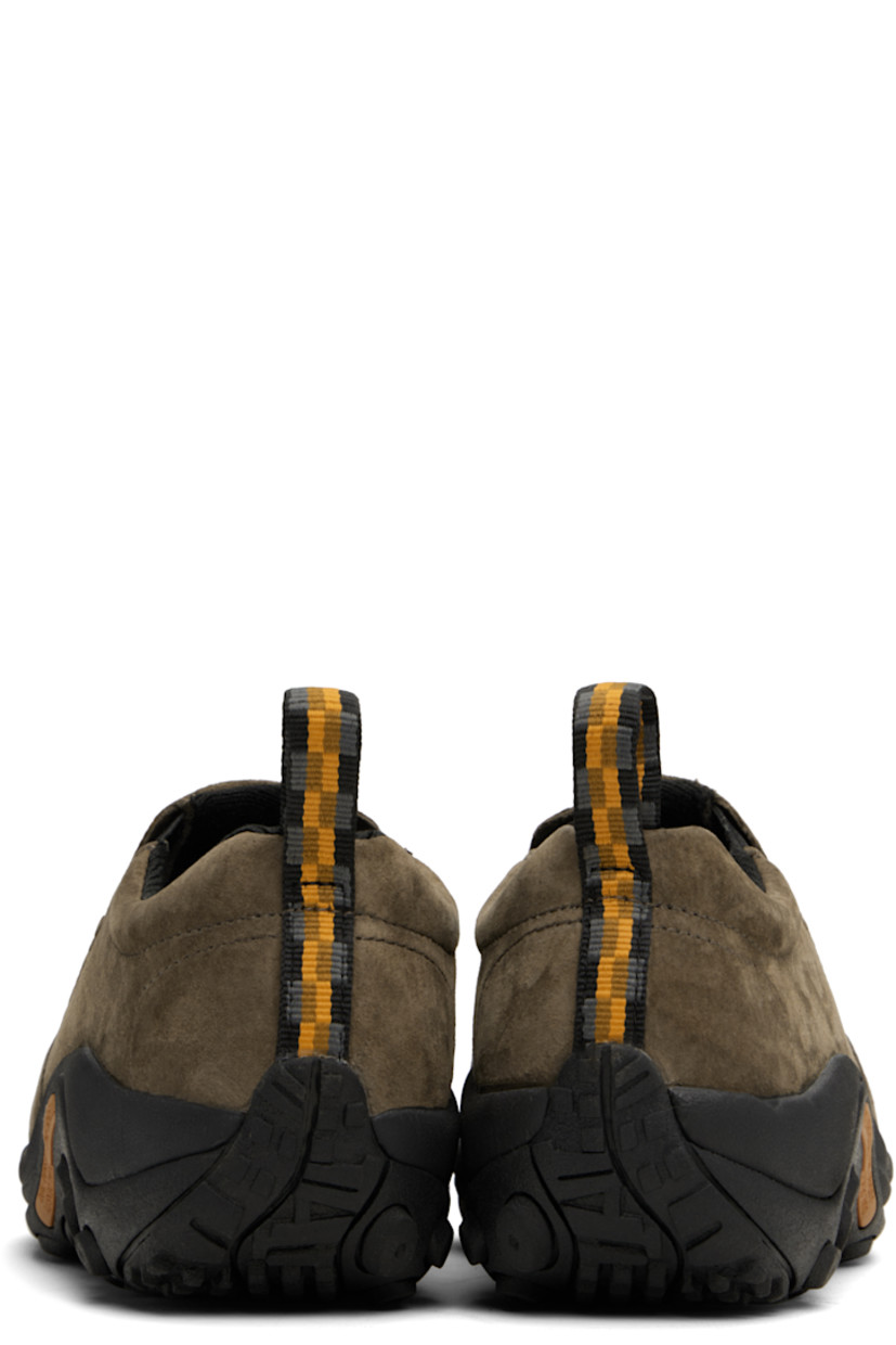 Low-top pigskin suede slip-on sneakers in gray.

· Elasticized gusset at padded tongue
· Padded collar
· Logo embossed at outer side
· Pull-loop at heel tab
· Jersey lining
· Merrell M Select™ FIT.ECO molded footbed
· Merrell Air Cushion at heel midsole
· Treaded Kinetic Fit™ BASE rubber sole

Supplier color: Gunsmoke