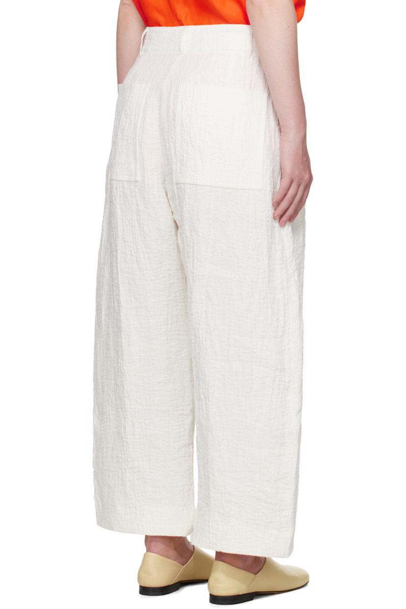 Textured linen- and cotton-blend double-gauze trousers.

· Wide-leg
· Belt loops
· Four-pocket styling
· Zip fly
· Dropped inseam
· Cropped legs
· Curved outseams

Supplier color: Parchment