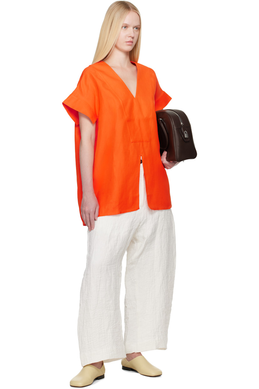 Textured linen- and cotton-blend double-gauze trousers.

· Wide-leg
· Belt loops
· Four-pocket styling
· Zip fly
· Dropped inseam
· Cropped legs
· Curved outseams

Supplier color: Parchment