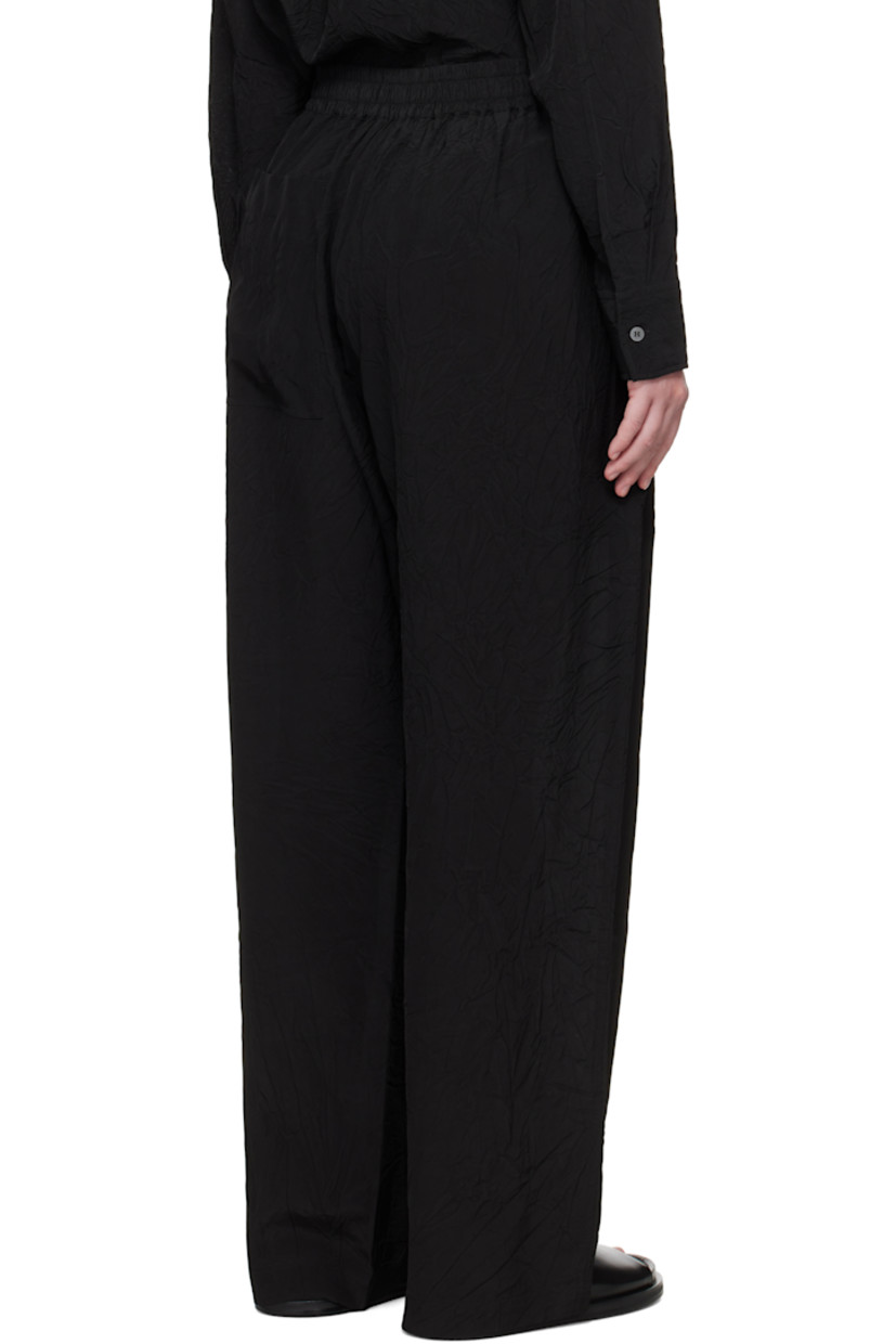 Crinkled plain-woven viscose trousers. 

· Drawstring at elasticized waistband
· Three-pocket styling
· Mock fly

Supplier color: Black