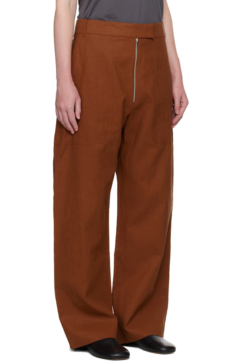 Wide-leg coated plain-woven linen trousers. 

· High-rise
· Belt loops
· Four-pocket styling
· Exposed zip fly

Supplier color: Truffle