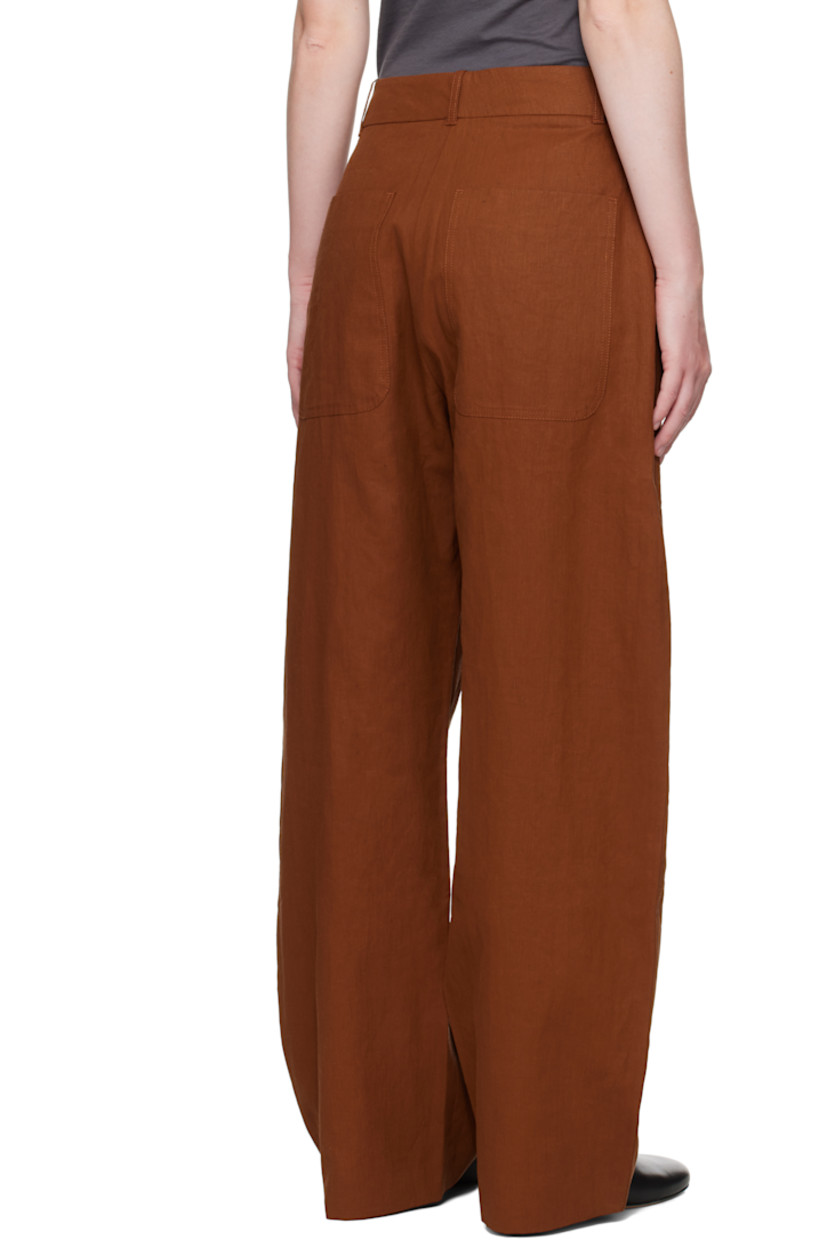 Wide-leg coated plain-woven linen trousers. 

· High-rise
· Belt loops
· Four-pocket styling
· Exposed zip fly

Supplier color: Truffle