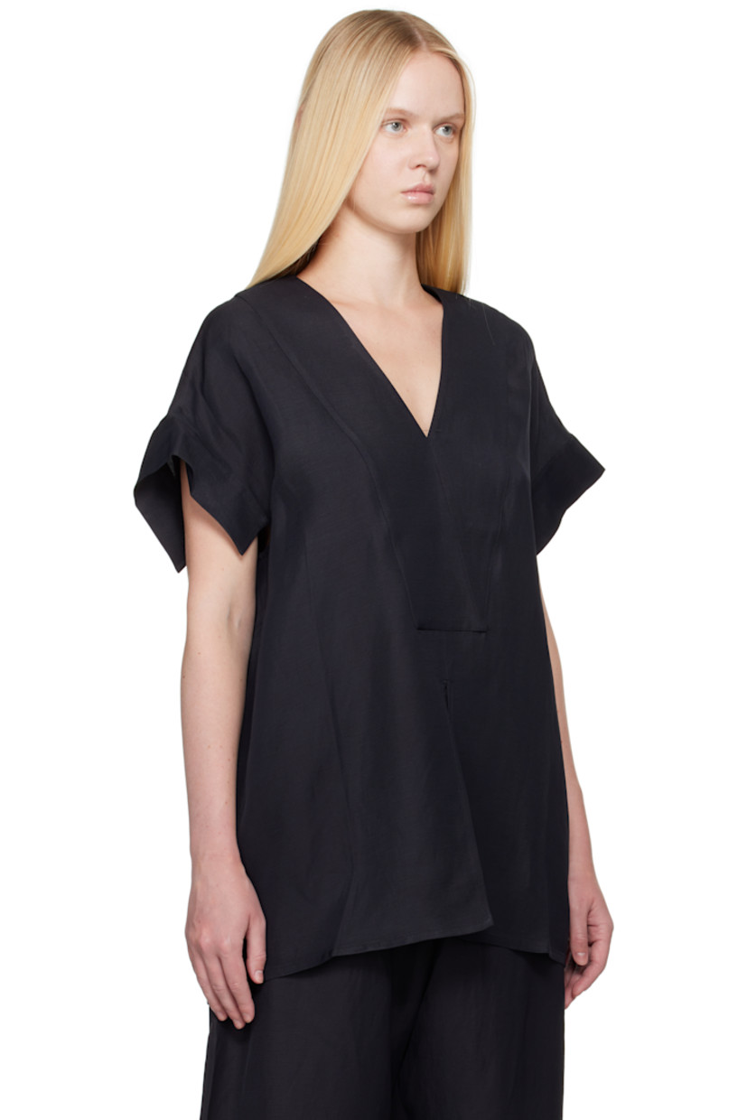 Viscose- and linen-blend twill top.

· Plunging V-neck
· Vent at front hem
· Cap sleeves
· Central seam at back

Supplier color: Darkest navy