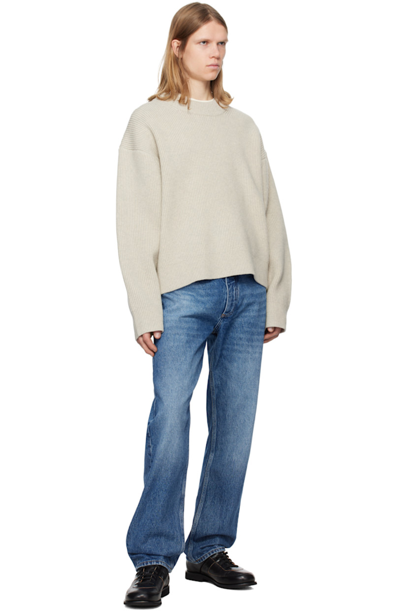 Straight-leg non-stretch regenerative cotton-blend denim jeans. Fading and whiskering throughout. 

· Pre-washed 
· Mid-rise
· Belt loops
· Five-pocket styling
· Zip-fly
· Leather logo patch at back waistband

Supplier color: Worn wash indigo