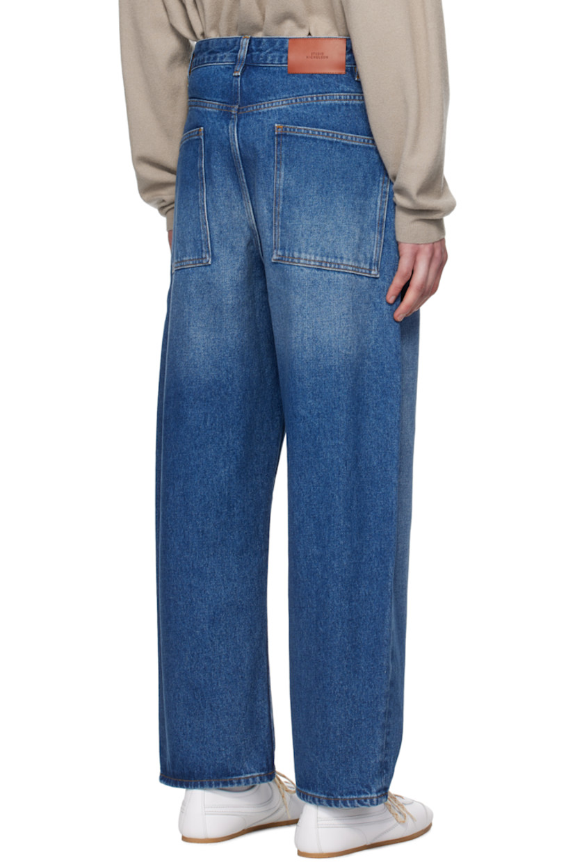 Oversized non-stretch regenerative cotton-blend denim jeans.

· Wide-leg 
· Mid-rise
· Belt loops
· Five-pocket styling
· Zip-fly
· Leather logo patch at back waistband

Supplier color: Worn wash indigo