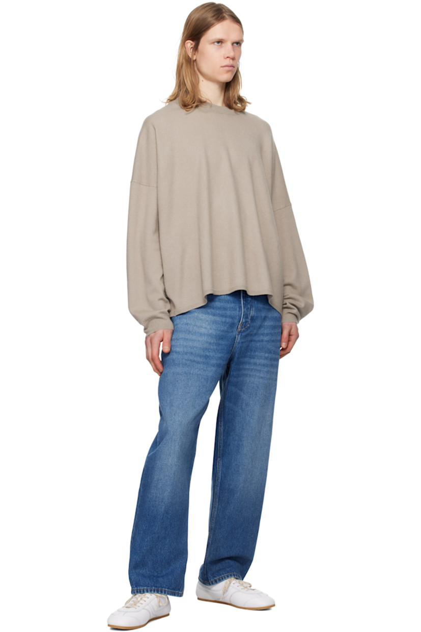 Oversized non-stretch regenerative cotton-blend denim jeans.

· Wide-leg 
· Mid-rise
· Belt loops
· Five-pocket styling
· Zip-fly
· Leather logo patch at back waistband

Supplier color: Worn wash indigo