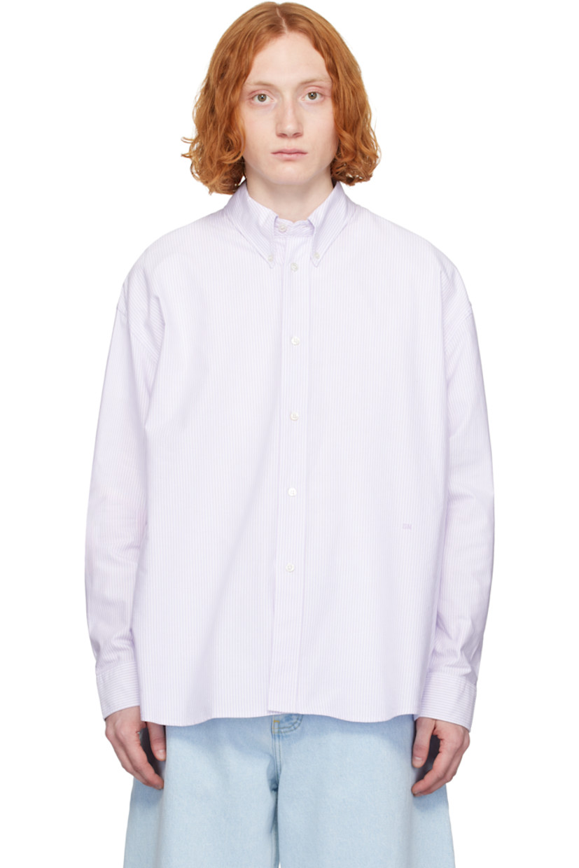 Oversized cotton oxford cloth shirt. Stripes throughout.

· Button-down spread collar
· Button closure
· Logo embroidered at front
· Shirttail hem
· Dropped shoulders
· Pleat at single-button barrel cuffs
· Locker loop and box pleat at back yoke

Supplier color: Lilac stripe