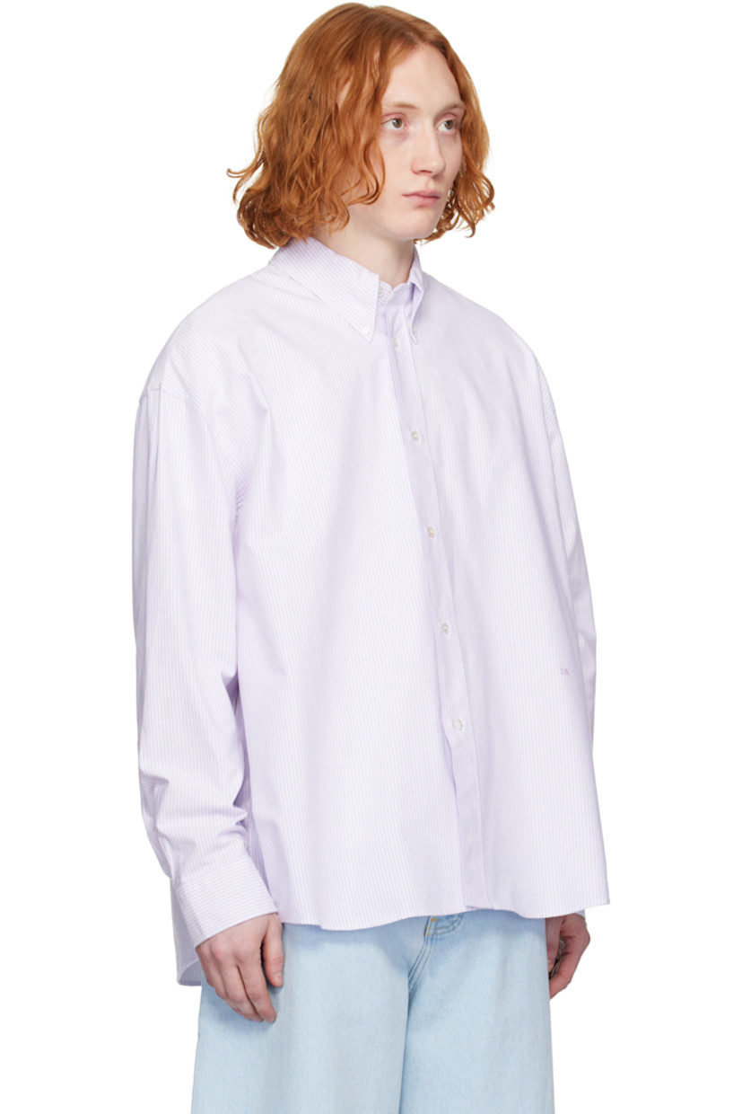Oversized cotton oxford cloth shirt. Stripes throughout.

· Button-down spread collar
· Button closure
· Logo embroidered at front
· Shirttail hem
· Dropped shoulders
· Pleat at single-button barrel cuffs
· Locker loop and box pleat at back yoke

Supplier color: Lilac stripe