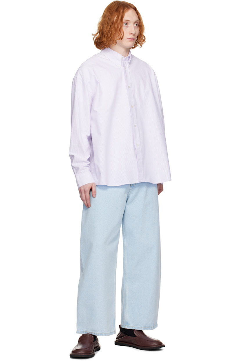 Oversized cotton oxford cloth shirt. Stripes throughout.

· Button-down spread collar
· Button closure
· Logo embroidered at front
· Shirttail hem
· Dropped shoulders
· Pleat at single-button barrel cuffs
· Locker loop and box pleat at back yoke

Supplier color: Lilac stripe