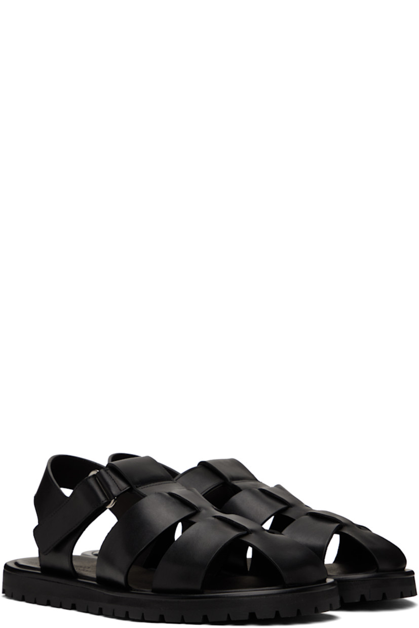 Buffed calfskin flat sandals in black.

· Velcro ankle strap
· Logo stamp at padded footbed
· Buffed leather lining
· Treaded Vibram® rubber sole

Supplier color: Black
