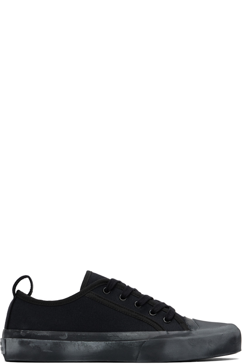 Low-top cotton canvas sneakers in navy.

· Textured rubber cap toe
· Lace-up closure
· Pull-loop at heel collar
· Twill lining
· Treaded vulcanized rubber sole

Supplier color: Darkest navy