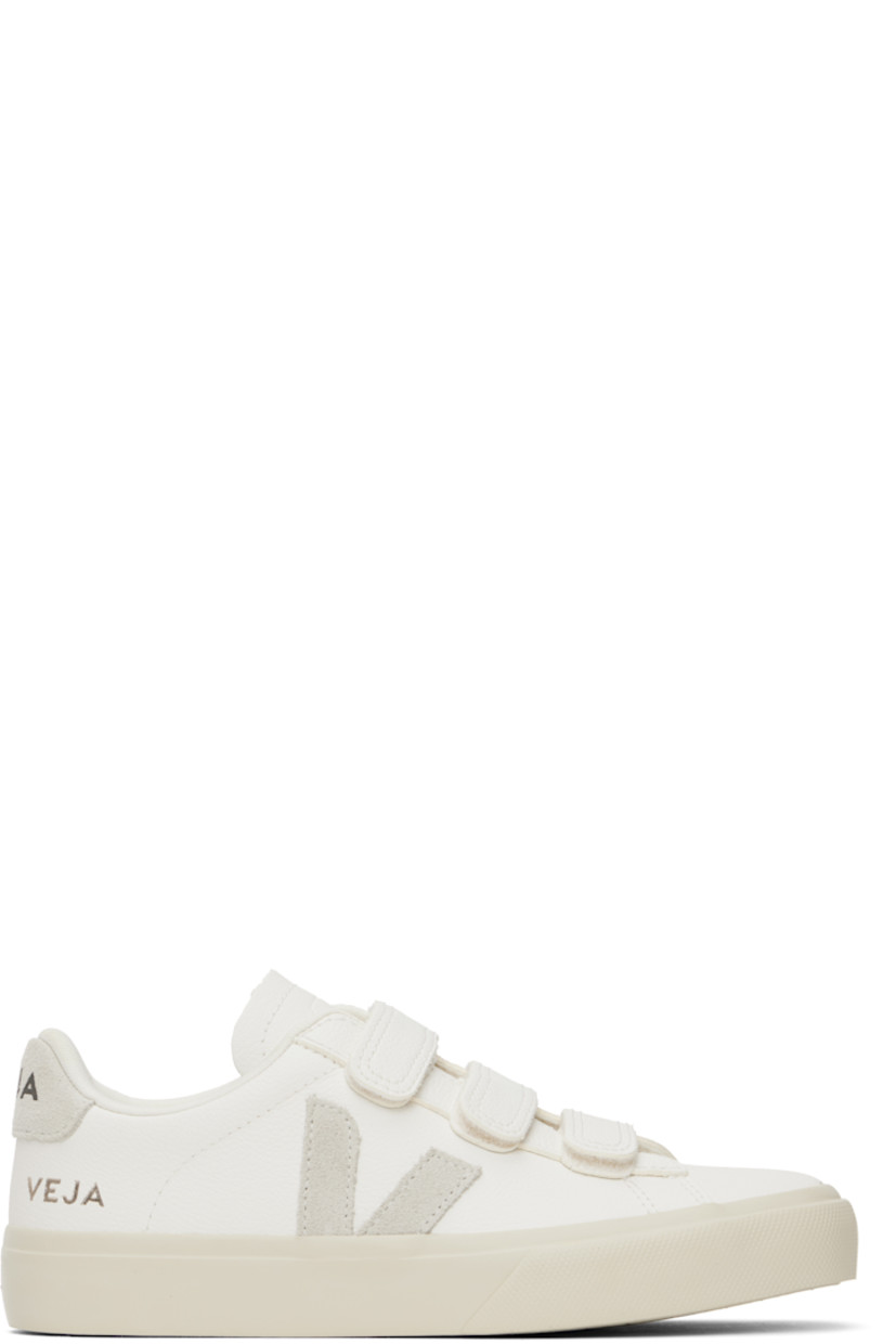Low-top ChromeFree grained leather sneakers in white.

· Velcro straps at vamp
· Logo embossed at padded tongue
· Padded collar
· Suede logo appliqué at sides
· Logo stamp at outer side
· Logo printed at suede heel tab
· Recycled polyester jersey lining
· Treaded rubber sole

Supplier color: White/Natural