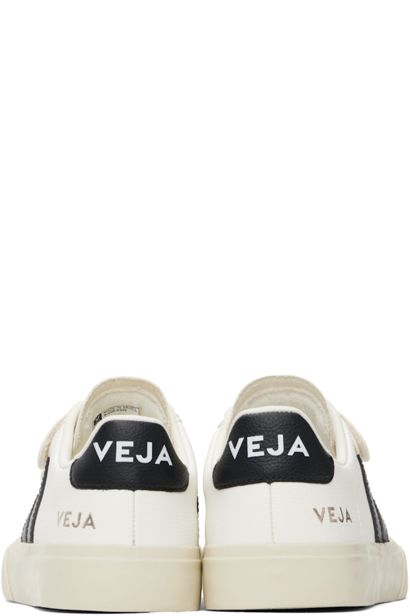 Low-top ChromeFree grained leather sneakers in white.

· Velcro straps at vamp
· Logo embossed at padded tongue
· Padded collar
· Rubberized logo appliqué at sides
· Logo stamp at outer side
· Logo printed at heel tab
· Recycled polyester jersey lining
· Treaded rubber sole

Supplier color: Extra-white/Black