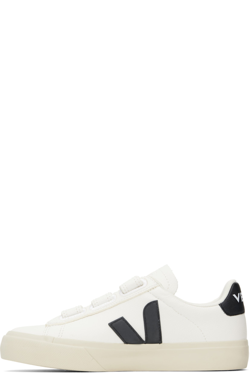 Low-top ChromeFree grained leather sneakers in white.

· Velcro straps at vamp
· Logo embossed at padded tongue
· Padded collar
· Rubberized logo appliqué at sides
· Logo stamp at outer side
· Logo printed at heel tab
· Recycled polyester jersey lining
· Treaded rubber sole

Supplier color: Extra-white/Black