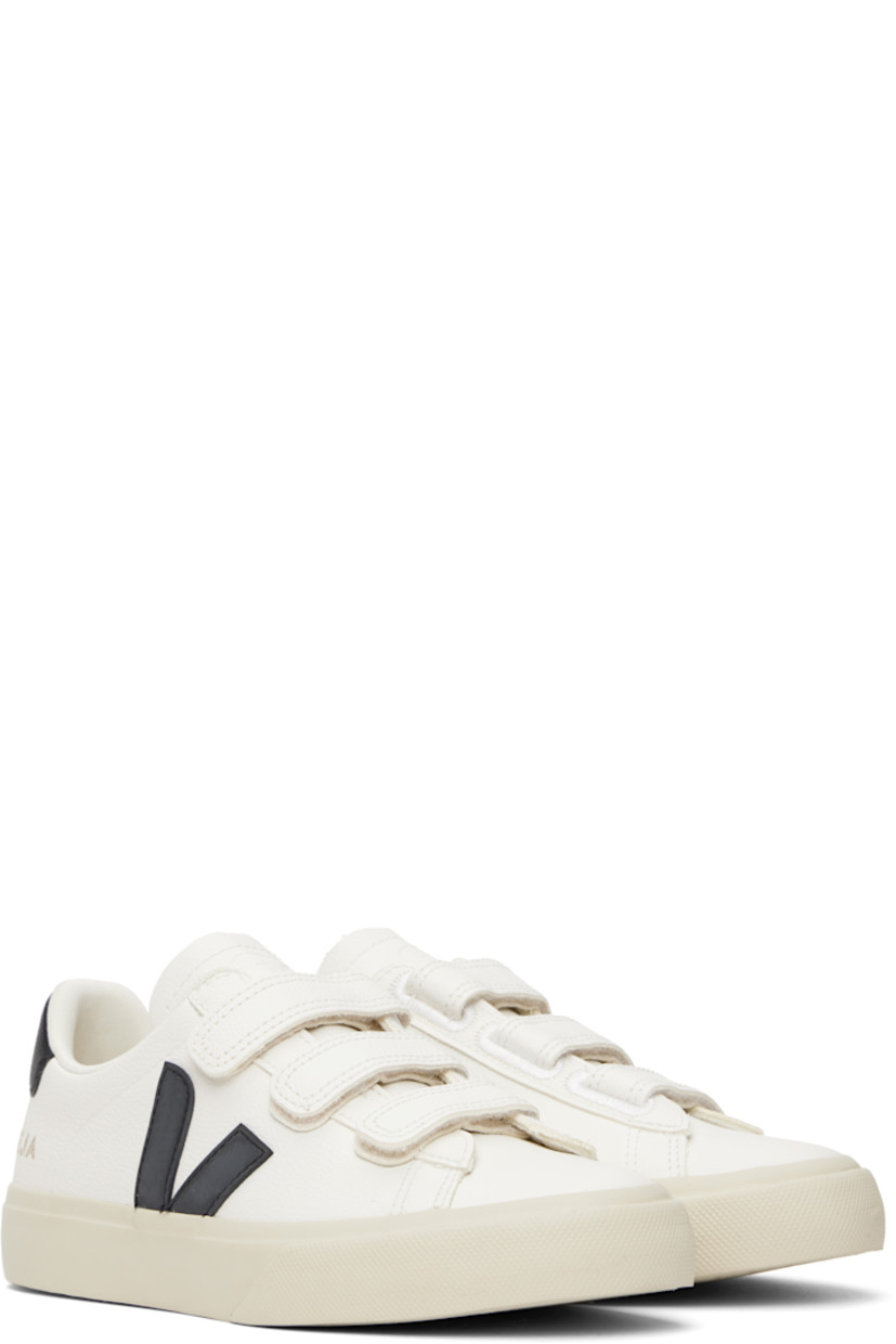 Low-top ChromeFree grained leather sneakers in white.

· Velcro straps at vamp
· Logo embossed at padded tongue
· Padded collar
· Rubberized logo appliqué at sides
· Logo stamp at outer side
· Logo printed at heel tab
· Recycled polyester jersey lining
· Treaded rubber sole

Supplier color: Extra-white/Black