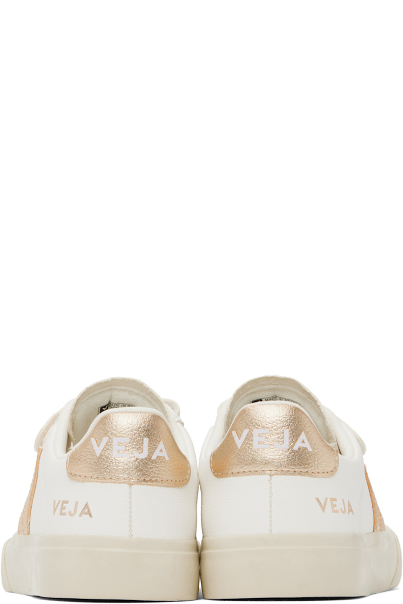Low-top ChromeFree grained leather sneakers in white.

· Velcro straps at vamp
· Logo embossed at padded tongue
· Padded collar
· Logo appliqué at sides
· Logo stamp at outer side
· Logo printed at heel tab
· Recycled polyester jersey lining
· Treaded rubber sole

Supplier color: White/Platine