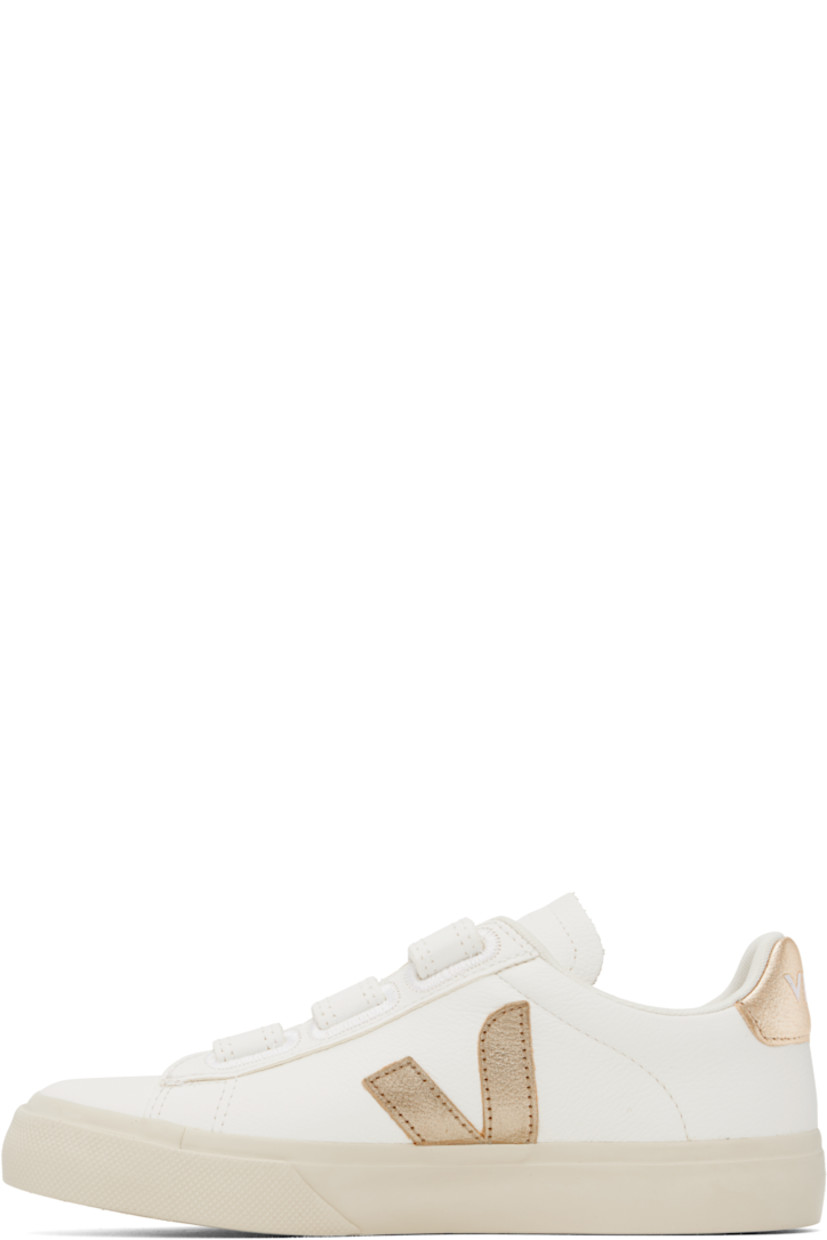 Low-top ChromeFree grained leather sneakers in white.

· Velcro straps at vamp
· Logo embossed at padded tongue
· Padded collar
· Logo appliqué at sides
· Logo stamp at outer side
· Logo printed at heel tab
· Recycled polyester jersey lining
· Treaded rubber sole

Supplier color: White/Platine