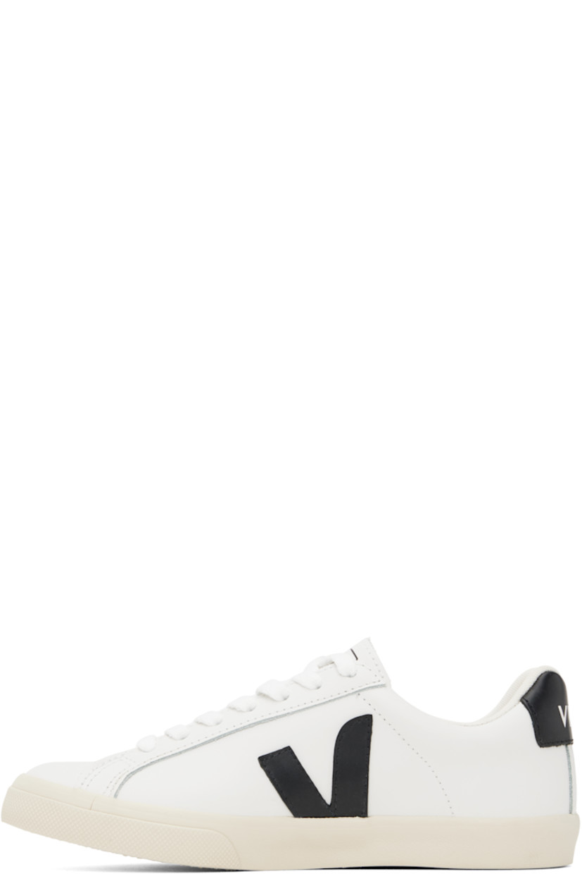Low-top buffed leather sneakers in white. 

· Lace-up closure
· Logo printed at tongue
· Padded collar
· Logo appliqué at sides
· Logo printed at heel tab
· Recycled polyester jersey lining
· Treaded rubber sole

Supplier color: White/Black