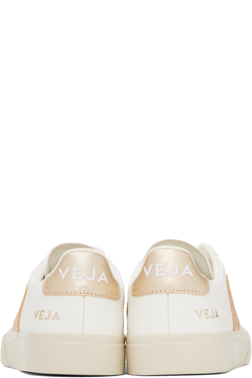 Low-top ChromeFree grained leather sneakers in white.

· Lace-up closure
· Logo embossed at padded tongue
· Padded collar
· Logo appliqué at sides
· Logo stamp at outer side
· Logo printed at heel tab
· Recycled polyester jersey lining
· Treaded rubber sole

Supplier color: Extra-white/Platine