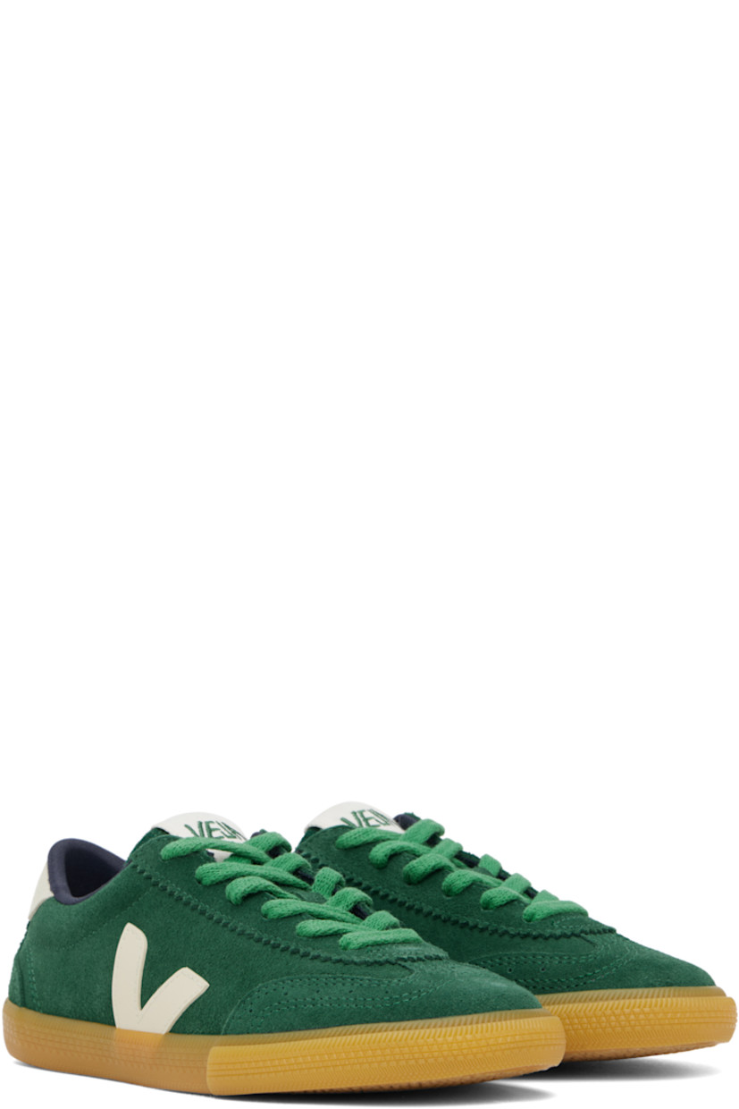 Low-top suede and ChromeFree buffed leather sneakers in green. 

· Water-repellent, non-PFC coating
· Perforated detailing at toe
· Serrated trim at lace-up closure
· Logo patch at padded tongue
· Padded collar
· Rubberized logo appliqué at sides
· Logo printed at heel tab
· Recycled polyester jersey lining
· Treaded rubber sole

Supplier color: Poker/Pierre