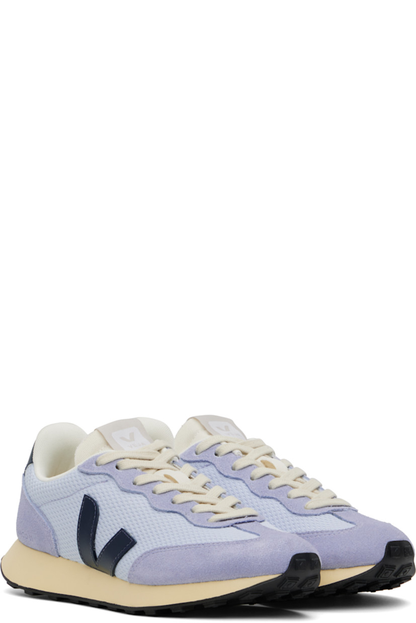 Low-top recycled polyester Alveomesh, suede, and buffed leather sneakers in blue.

· Lace-up closure
· Logo patch at padded tongue
· Padded collar
· Logo appliqué at sides
· Text embossed at outer side
· Logo printed at heel tab
· Recycled polyester jersey lining
· Treaded rubber sole

Supplier color: Swan/Nautico