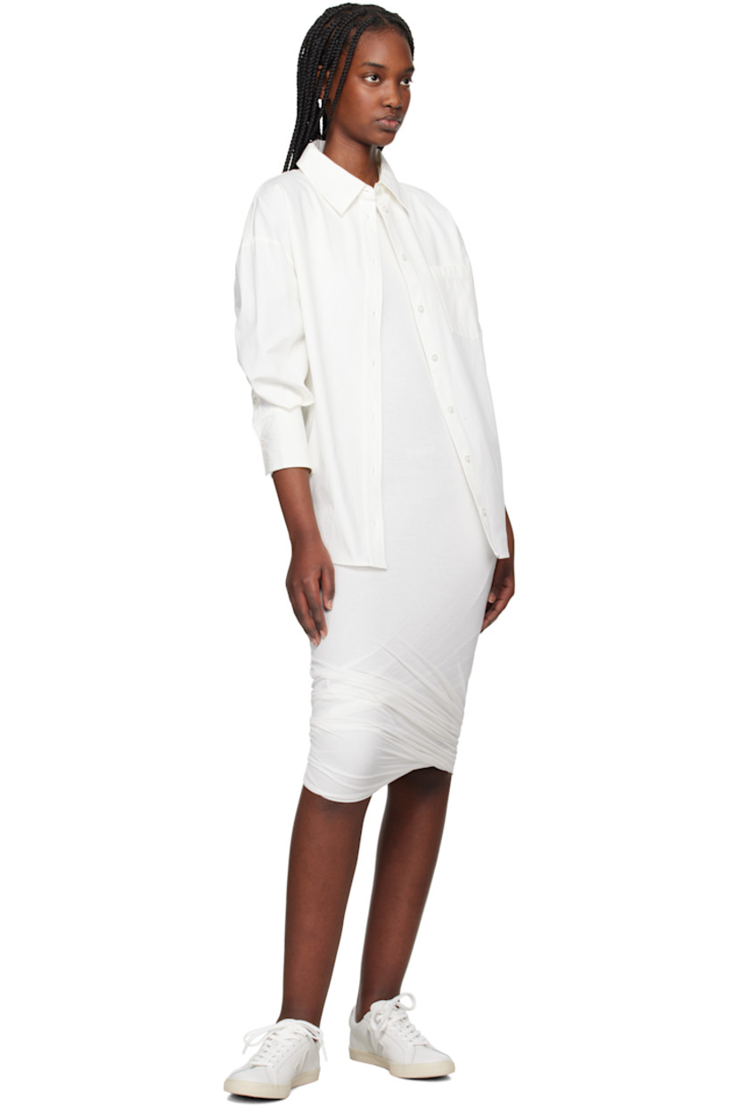 Low-top buffed leather sneakers in white. 

· Lace-up closure
· Logo printed at tongue
· Padded collar
· Logo appliqué at sides
· Logo printed at heel tab
· Recycled polyester jersey lining
· Treaded rubber sole

Supplier color: White/Silver