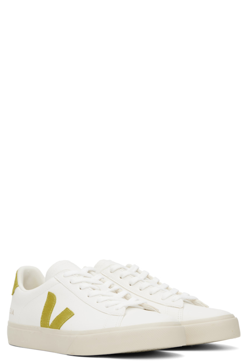 Low-top ChromeFree grained leather sneakers in white.

· Lace-up closure
· Logo embossed at padded tongue
· Padded collar
· Suede logo appliqué at sides
· Logo stamp at outer side
· Logo printed at suede heel tab
· Recycled polyester jersey lining
· Treaded rubber sole

Supplier color: White/Liquor