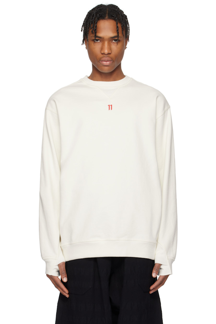 Garment-dyed cotton fleece sweatshirt.

· Rib-knit crewneck, hem, and cuffs
· Logo printed at chest
· Dropped shoulders
· Thumbhole at cuffs
· Embroidered eyelet with drawstring at back yoke
· Printed logo at back yoke

Supplier color: Off-white