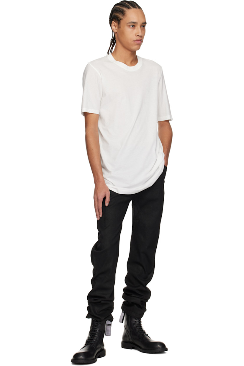 Garment-dyed cotton jersey T-shirt.

· Rib-knit crewneck
· Eyelet and extended trim at back

Supplier color: Off white