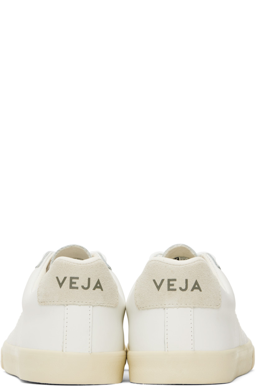 Low-top buffed leather sneakers in white. 

· Lace-up closure
· Logo printed at tongue
· Padded collar
· Logo stitched at sides
· Logo printed at suede heel tab
· Recycled polyester jersey lining
· Treaded rubber sole

Supplier color: White