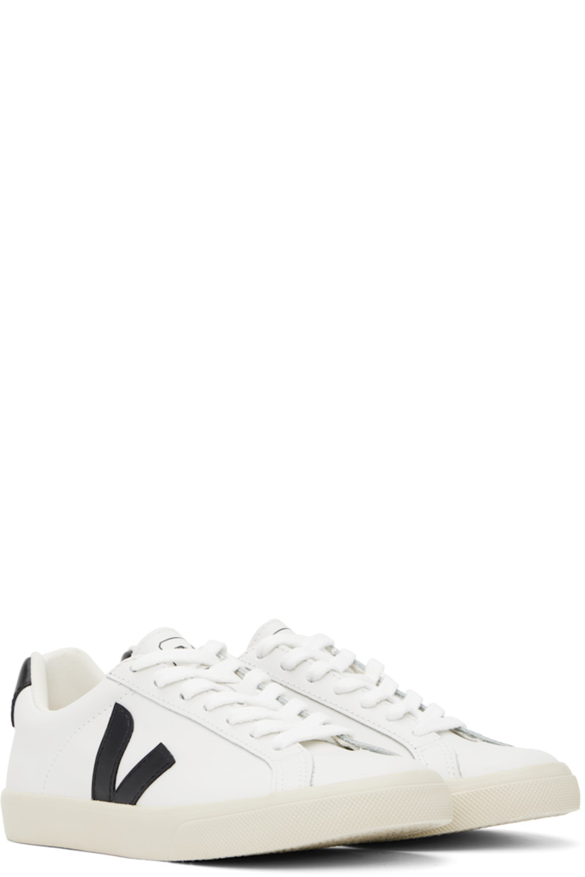 Low-top buffed leather sneakers in white. 

· Lace-up closure
· Logo printed at tongue
· Padded collar
· Logo appliqué at sides
· Logo printed at heel tab
· Recycled polyester jersey lining
· Treaded rubber sole

Supplier color: White/Black