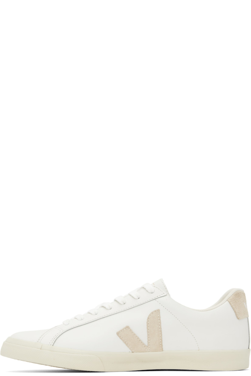 Low-top buffed leather sneakers in white.

· Lace-up closure
· Logo printed at tongue
· Padded collar
· Suede logo appliqué at sides
· Logo printed at suede heel tab
· Recycled polyester jersey lining
· Treaded rubber sole

Supplier color: White/Sable
