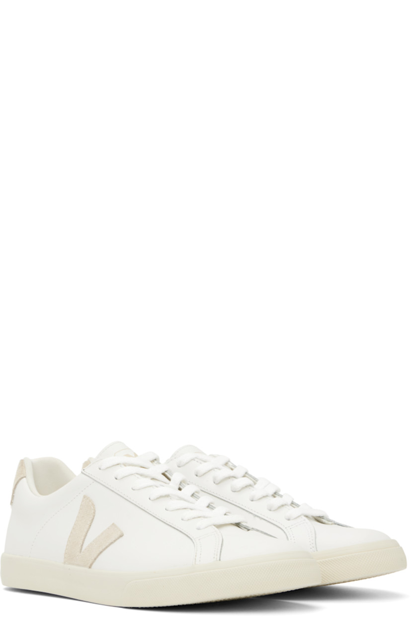 Low-top buffed leather sneakers in white.

· Lace-up closure
· Logo printed at tongue
· Padded collar
· Suede logo appliqué at sides
· Logo printed at suede heel tab
· Recycled polyester jersey lining
· Treaded rubber sole

Supplier color: White/Sable