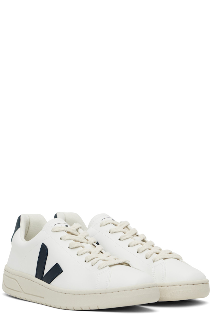 Low-top coated organic cotton faux-leather sneakers in white.

· Lace-up closure
· Logo printed at padded tongue
· Padded collar
· Rubberized logo appliqué at sides
· Logo printed at heel tab
· Recycled polyester jersey lining
· Treaded rubber sole

Supplier color: White/Nautico
